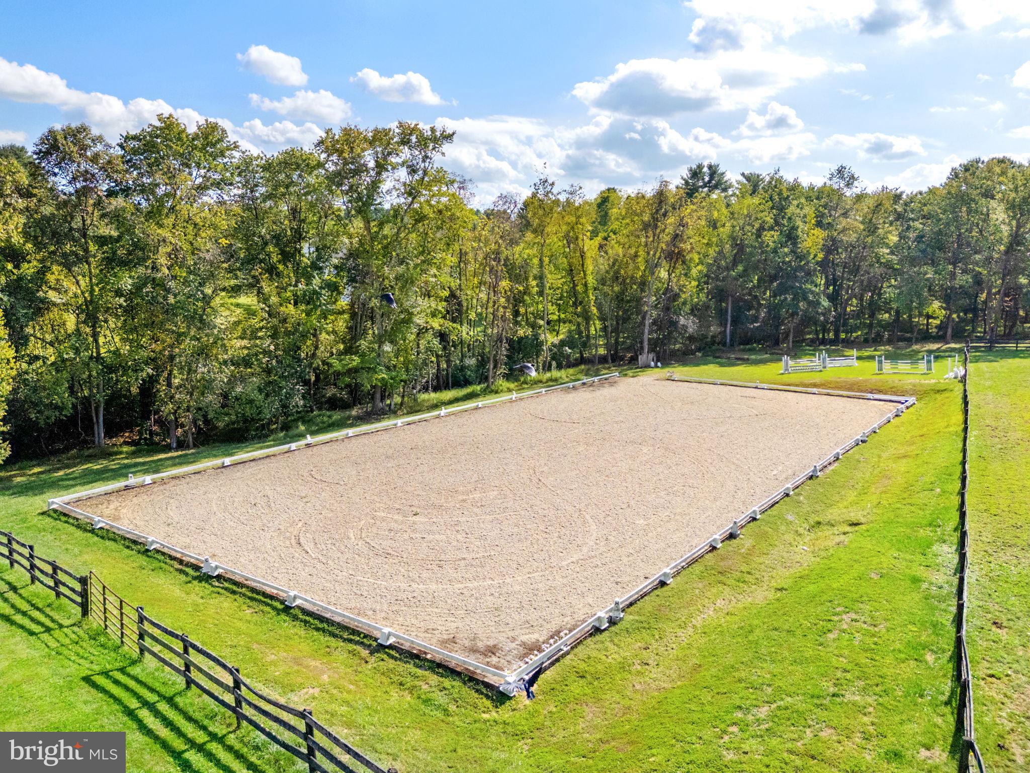 36775 Leith Lane Middleburg, VA 20117 - Photo 56 of 70 a view of a swimming pool with an outdoor space and seating area