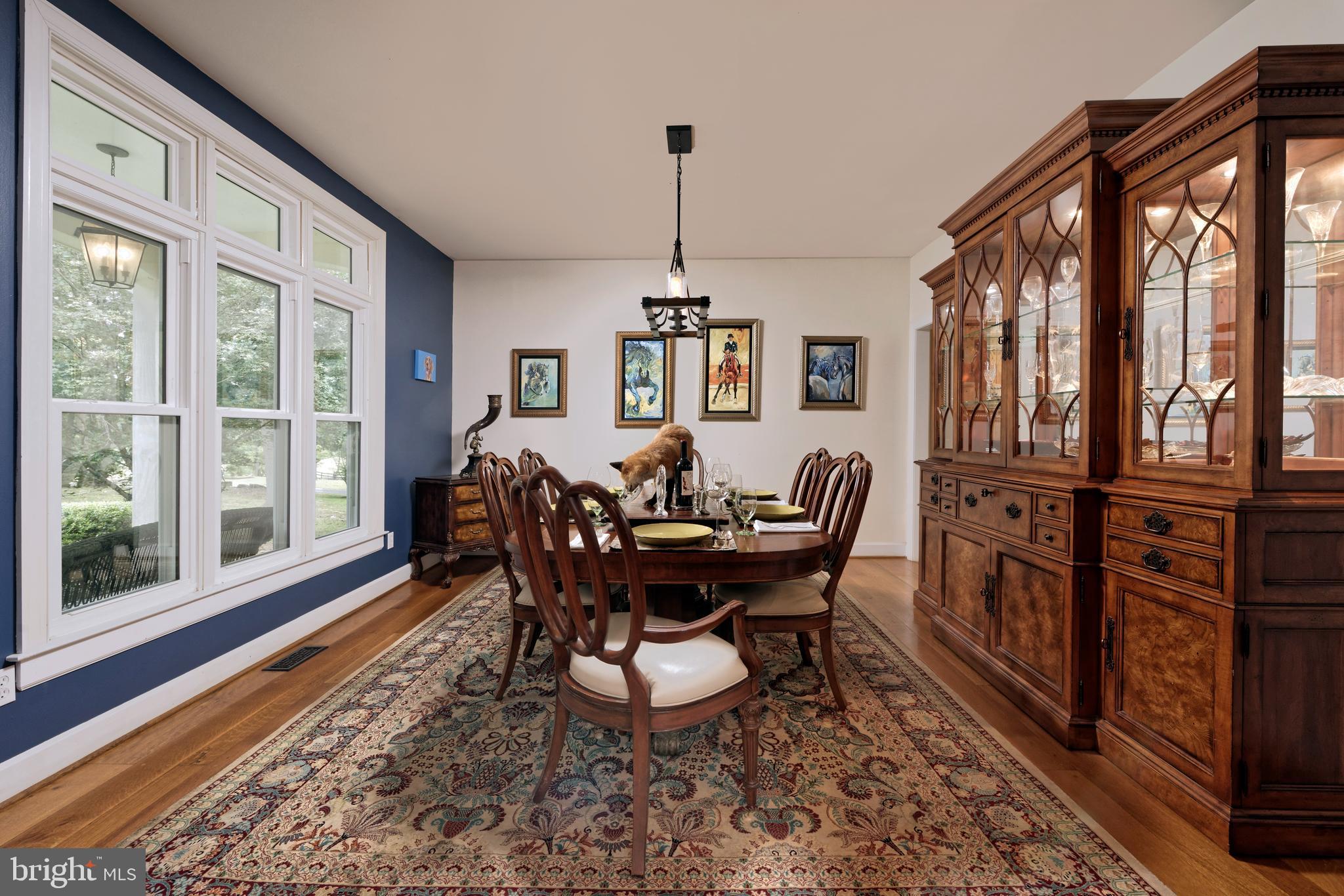 36775 Leith Lane Middleburg, VA 20117 - Photo 6 of 70 a dining room with furniture a rug and wooden floor