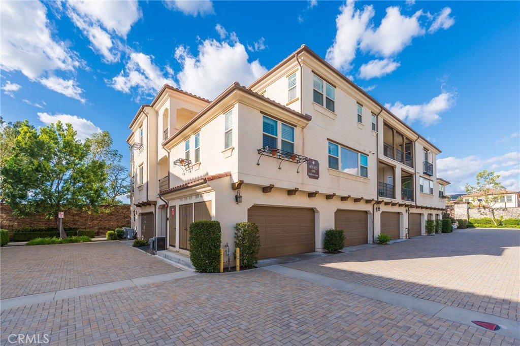 a view of a building with a street