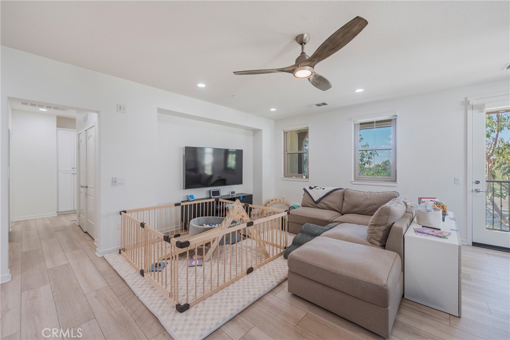 409 Mallorca Lane Brea, CA 92823 - Photo 12 of 40 a living room with furniture and a flat screen tv