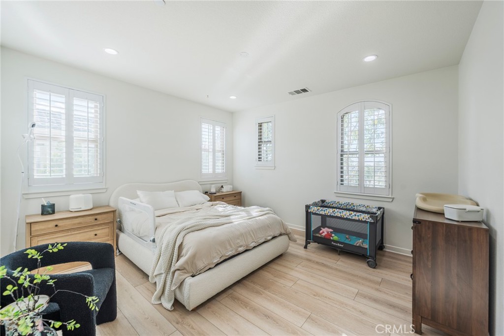 409 Mallorca Lane Brea, CA 92823 - Photo 14 of 40 a bedroom with a bed and a window