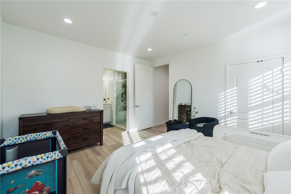 409 Mallorca Lane Brea, CA 92823 - Photo 15 of 40 a bed room with a bed and a dresser