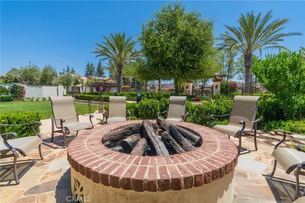 a view of a patio with swimming pool
