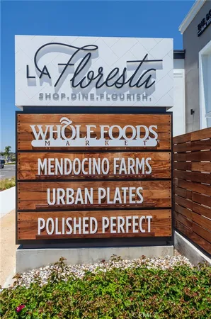 a view of a park with swings and slides