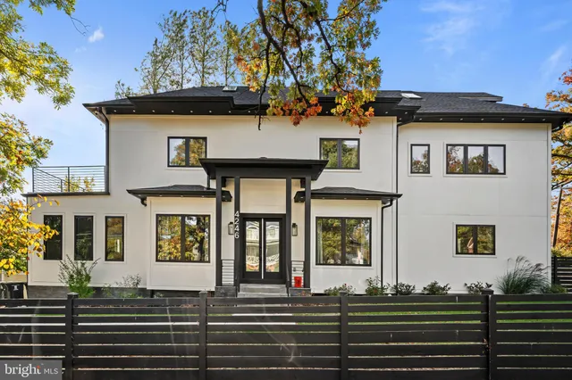 a front view of a house with street