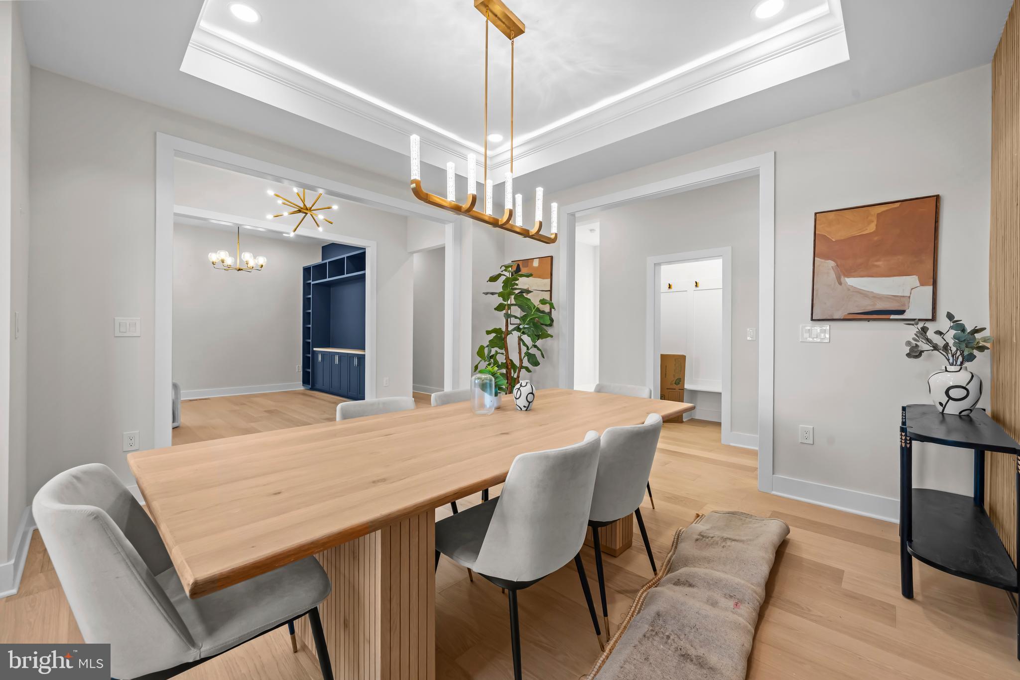 4246 15th Street North Arlington, VA 22207 - Photo 19 of 72 a dining room with a table chairs and kitchen view