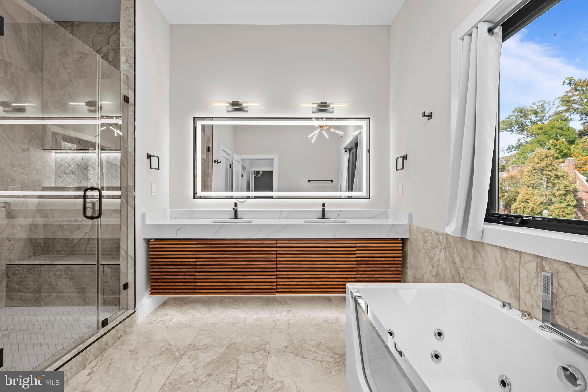 4246 15th Street North Arlington, VA 22207 - Photo 26 of 72 a bathroom with a bathtub and a shower