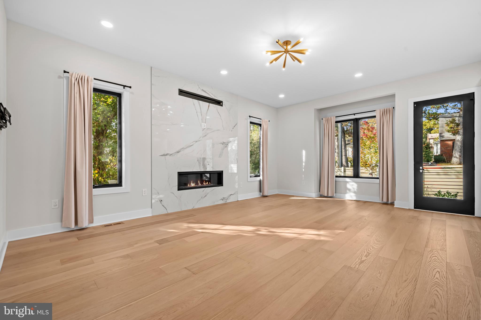 4246 15th Street North Arlington, VA 22207 - Photo 34 of 72 a view of an empty room with window and fireplace
