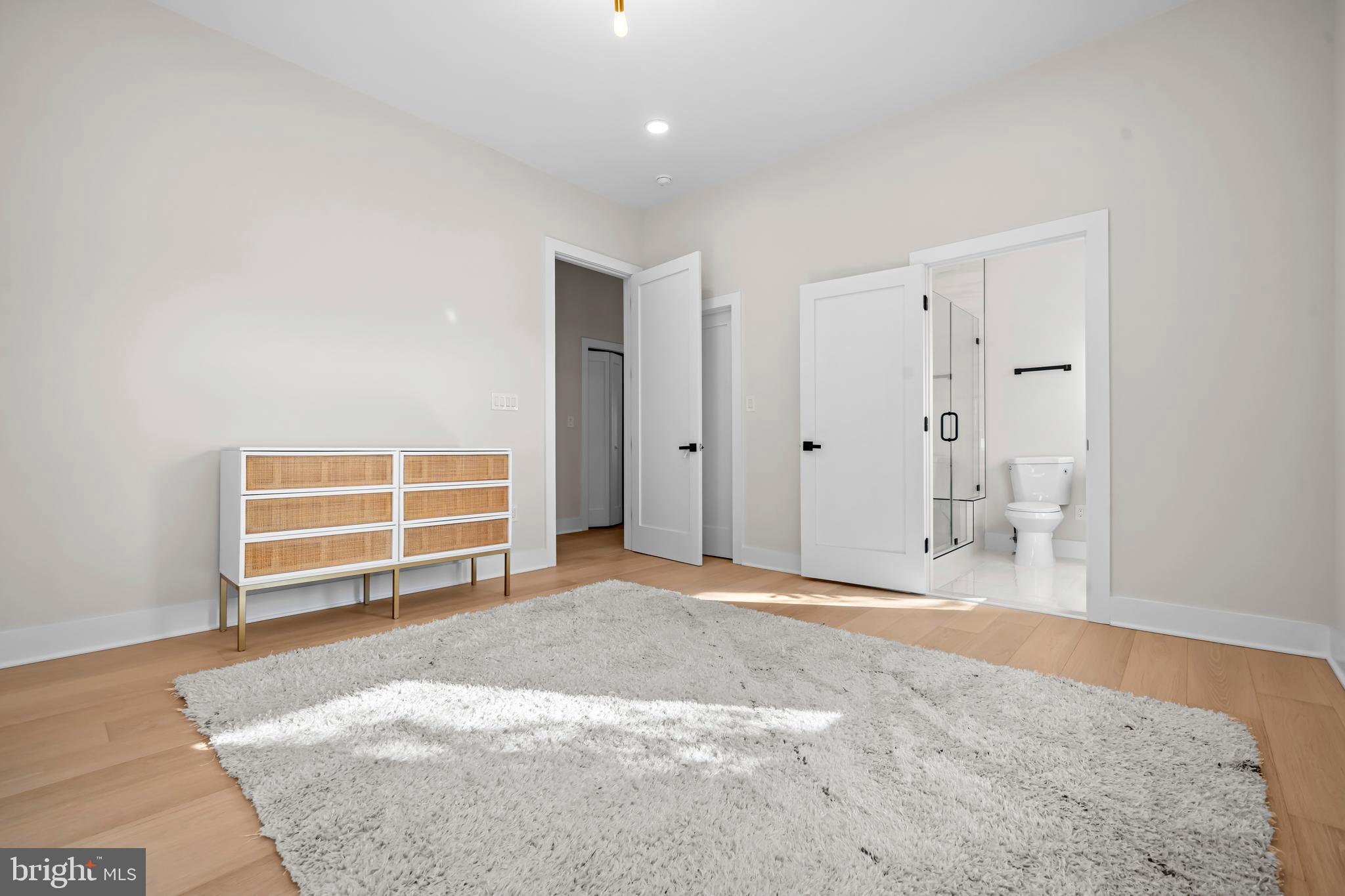 4246 15th Street North Arlington, VA 22207 - Photo 42 of 72 a view of empty room with wooden floor and fan