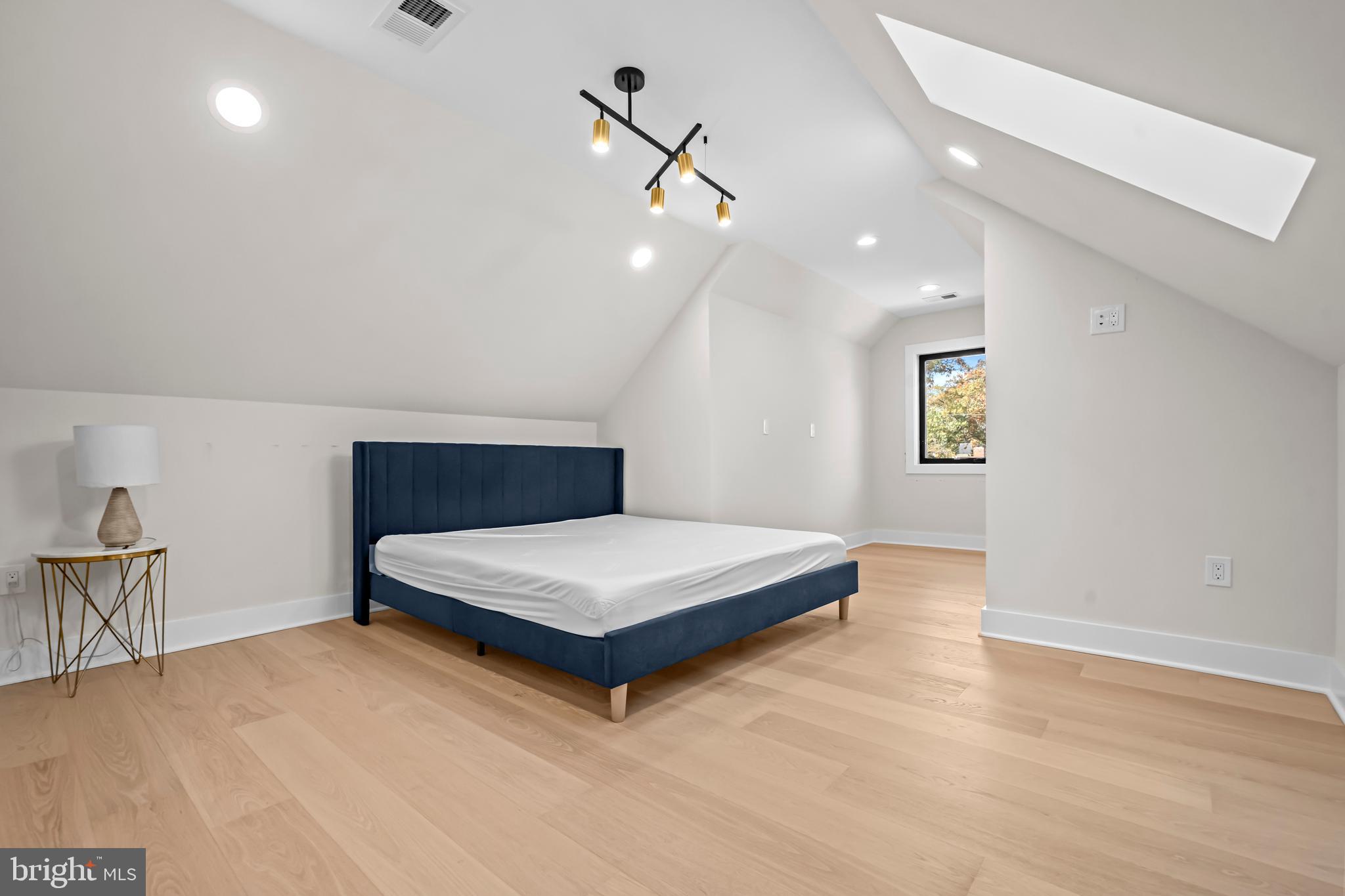 4246 15th Street North Arlington, VA 22207 - Photo 48 of 72 a living room with stainless steel appliances furniture and a chandelier