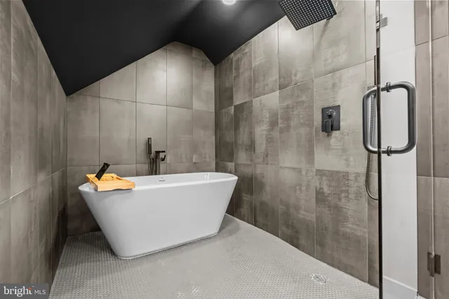 a aerial view of a house with a yard