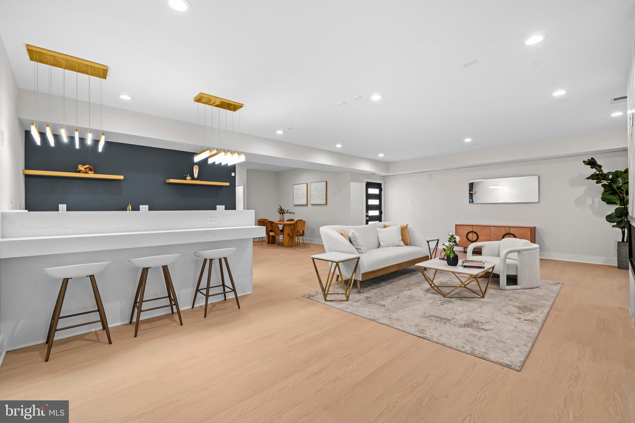 4246 15th Street North Arlington, VA 22207 - Photo 52 of 72 a living room with furniture and kitchen view