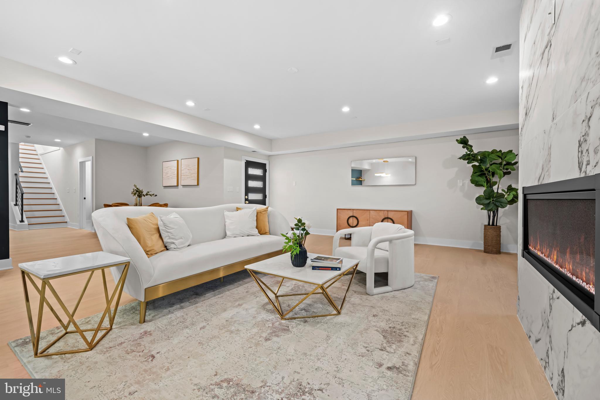 4246 15th Street North Arlington, VA 22207 - Photo 55 of 72 a living room with furniture and a flat screen tv