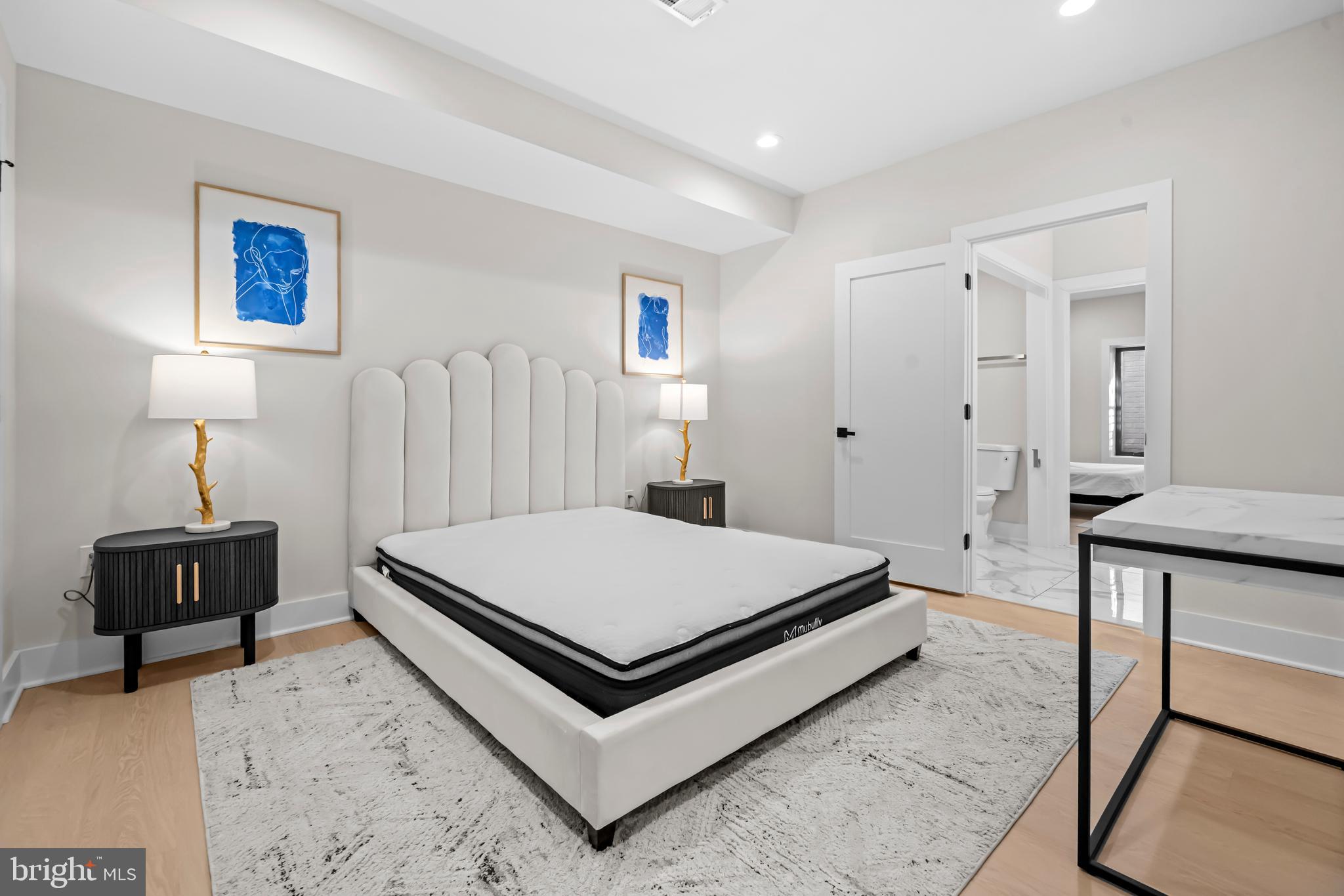 4246 15th Street North Arlington, VA 22207 - Photo 60 of 72 a room with a bed and a table