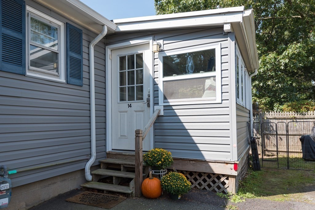 14 Gray Street Wareham, MA 02532 - Photo 11 of 33 a front view of a house with a yard
