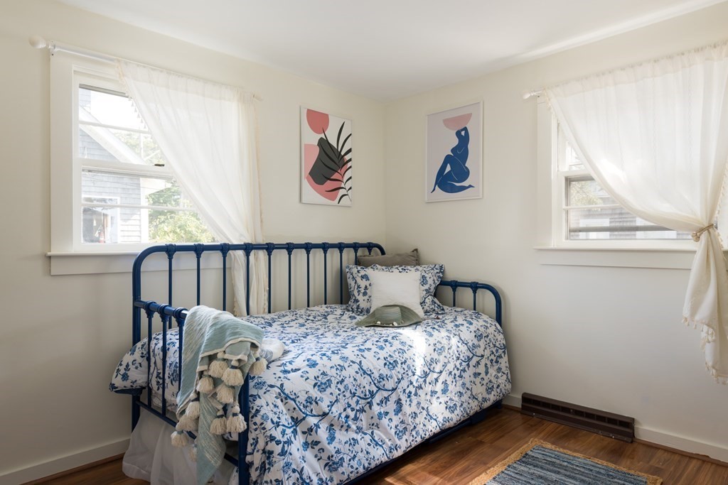 14 Gray Street Wareham, MA 02532 - Photo 18 of 33 a bed sitting in a bedroom next to a window