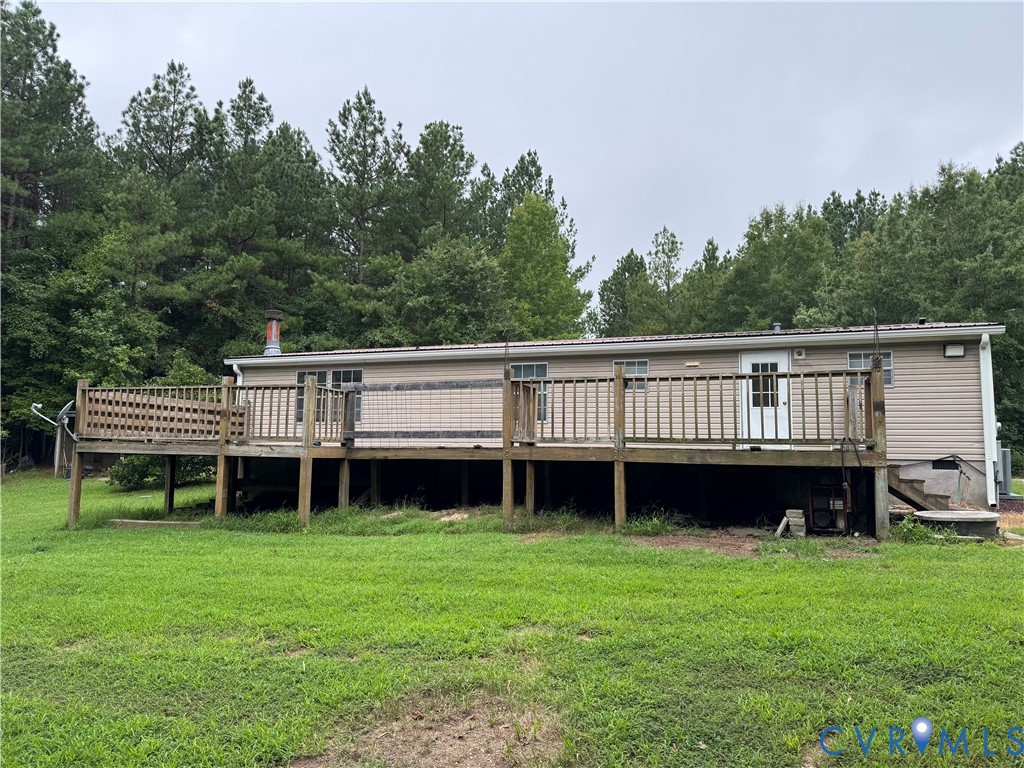 2824 Piney Green Road Crewe, VA 23930 - Photo 1 of 1 Back of house with a full deck and a yard.
