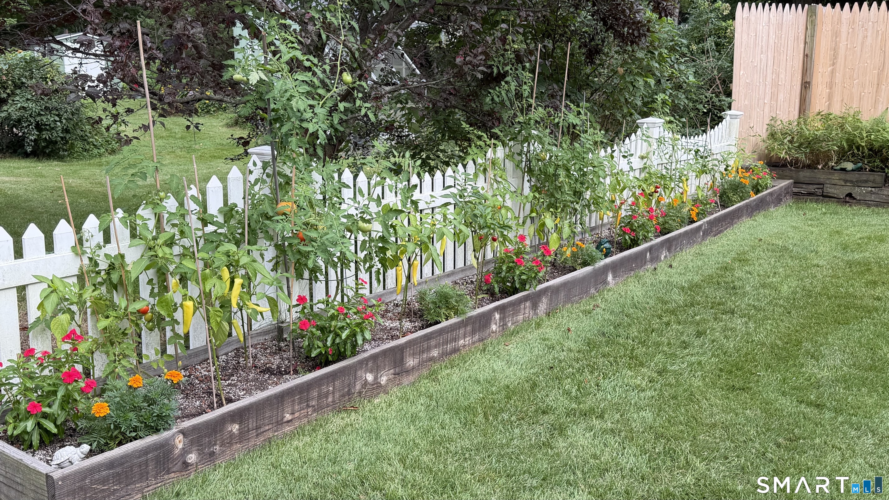 428 Hammock Road Westbrook, CT 06498 - Photo 32 of 40 Beautiful raised bed garden and flower bed