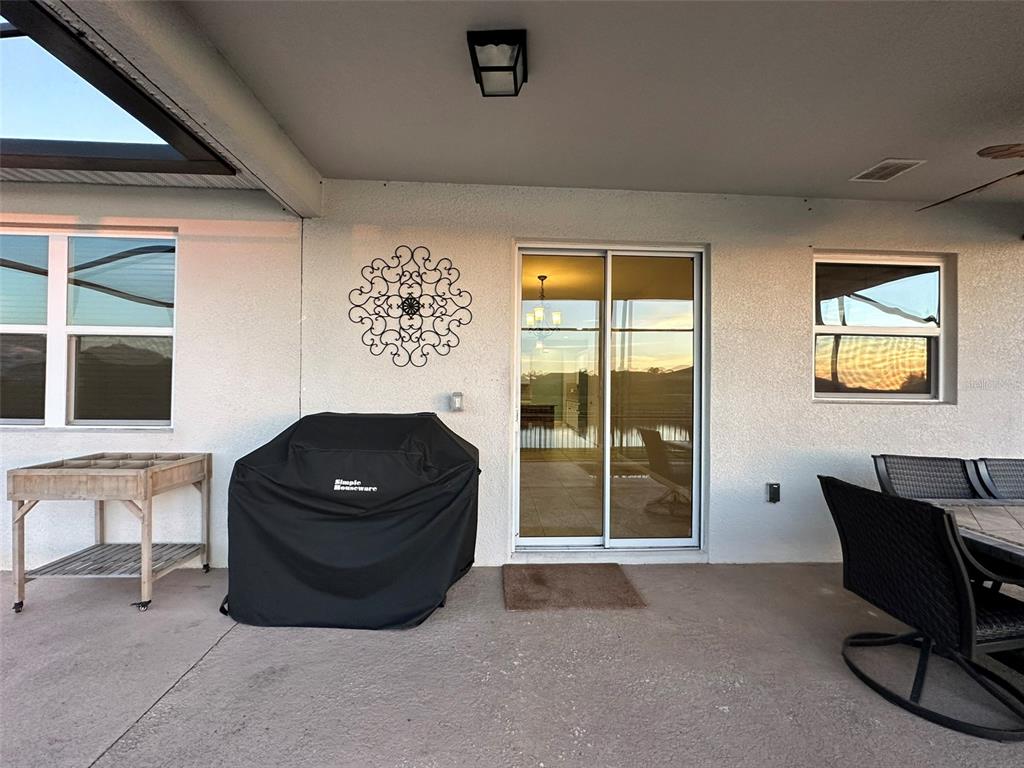 3008 Boat Lift Road Kissimmee, FL 34746 - Photo 38 of 56 a living room with furniture and a window