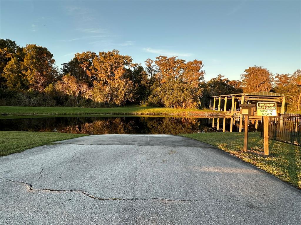 3008 Boat Lift Road Kissimmee, FL 34746 - Photo 51 of 56 front view of a house with a yard