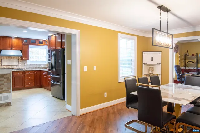 a workspace with furniture and a window