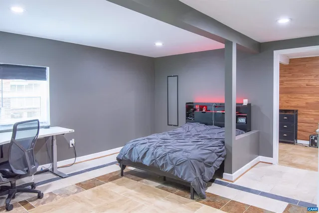 a view of a porch with a table and chairs