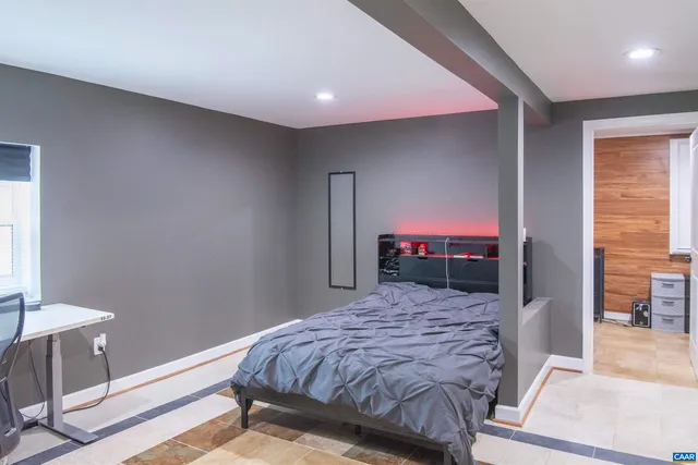 a view of a couches in the patio and a small yard