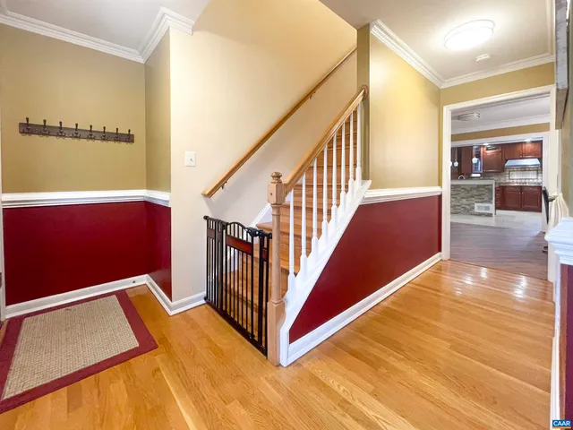 a view of a hallway with a dining room