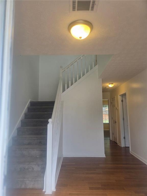 22 Windcrest Keep Covington, GA 30016 - Photo 16 of 32 a view of entryway and hall with wooden floor