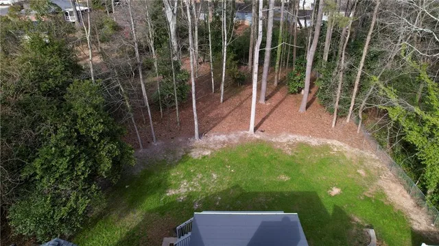 a view of backyard with green space