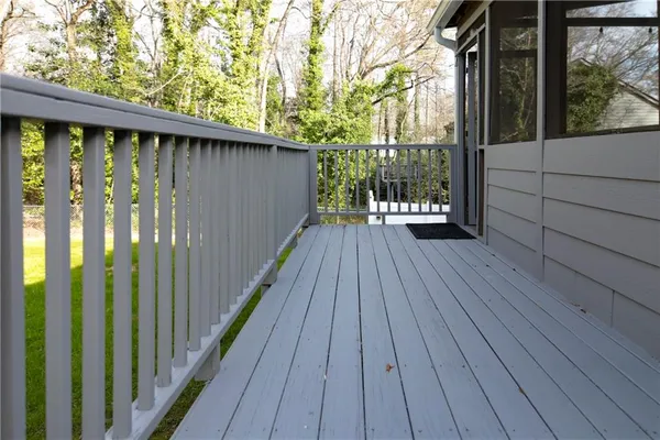 a view of outdoor space with wooden floor