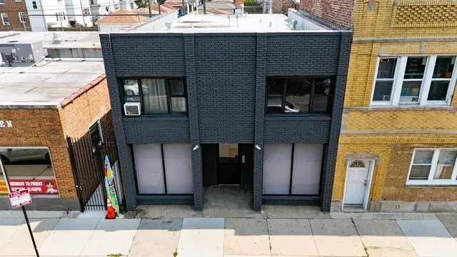 a front view of a house with a garage