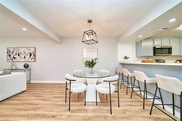 a view of a dining room with furniture