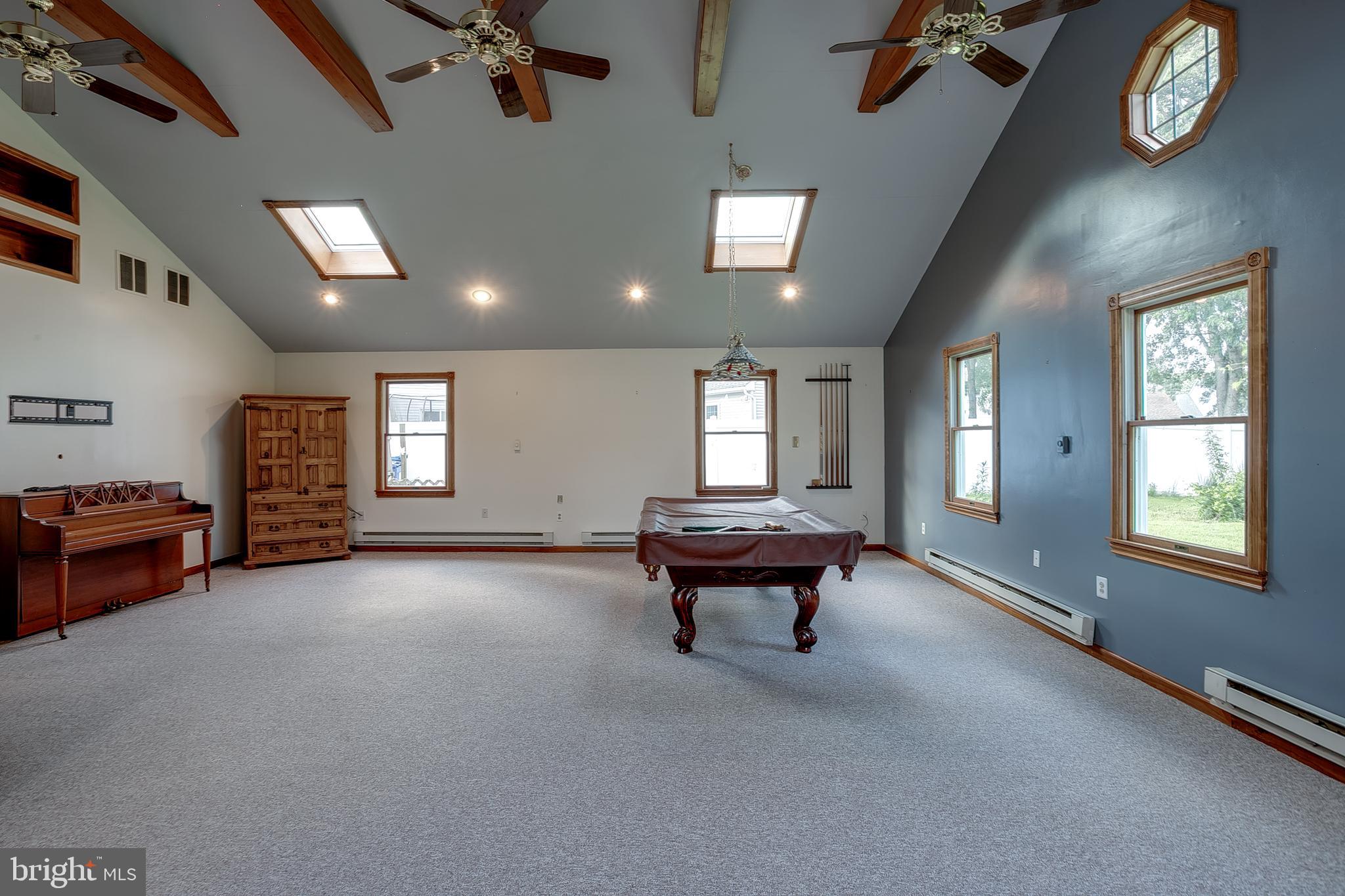 123 Wyndmere Road Marlton, NJ 08053 - Photo 15 of 31 a view of a livingroom with furniture a fireplace and window