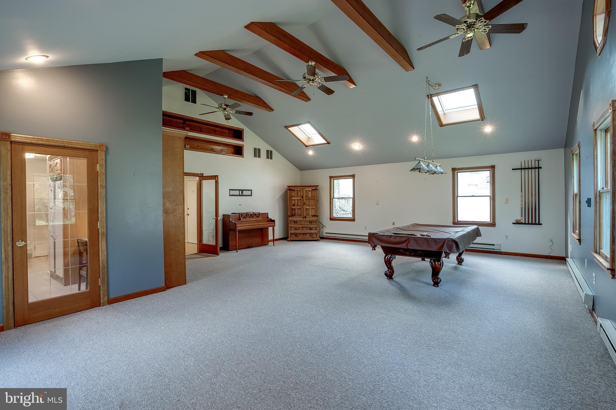 123 Wyndmere Road Marlton, NJ 08053 - Photo 16 of 31 a view of a livingroom with furniture and a ceiling fan