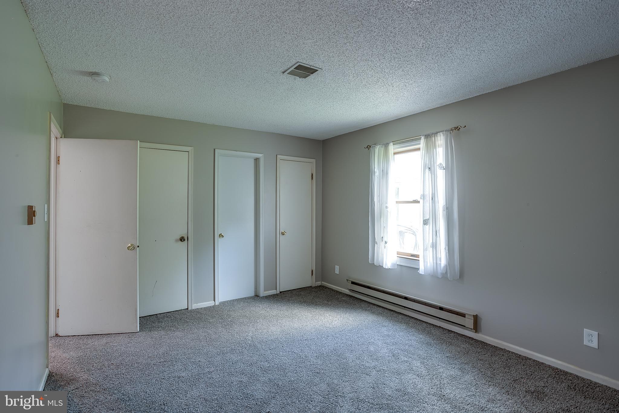 123 Wyndmere Road Marlton, NJ 08053 - Photo 20 of 31 a view of an empty room with a window
