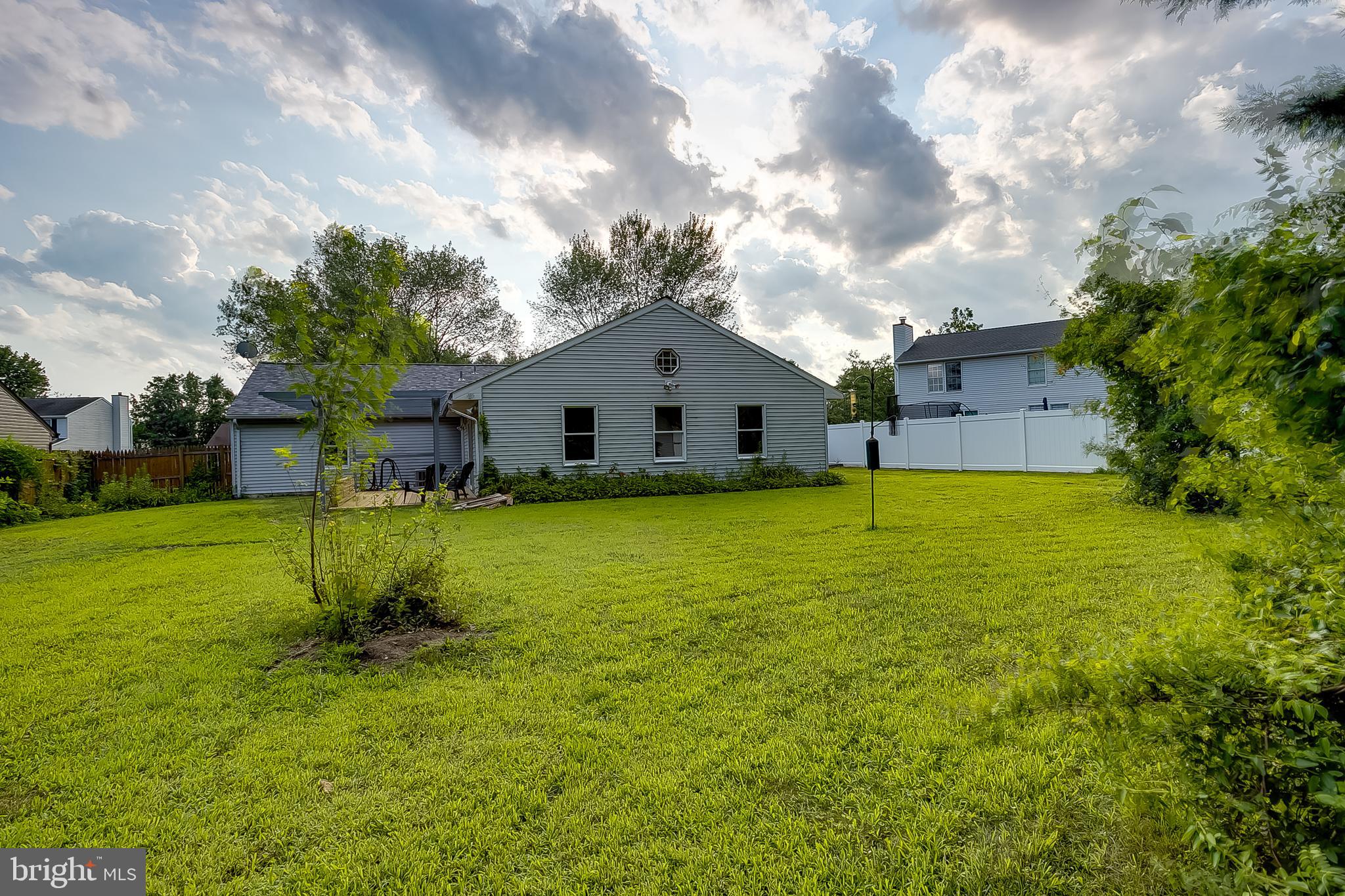 123 Wyndmere Road Marlton, NJ 08053 - Photo 29 of 31 a white house with a big yard and large tree