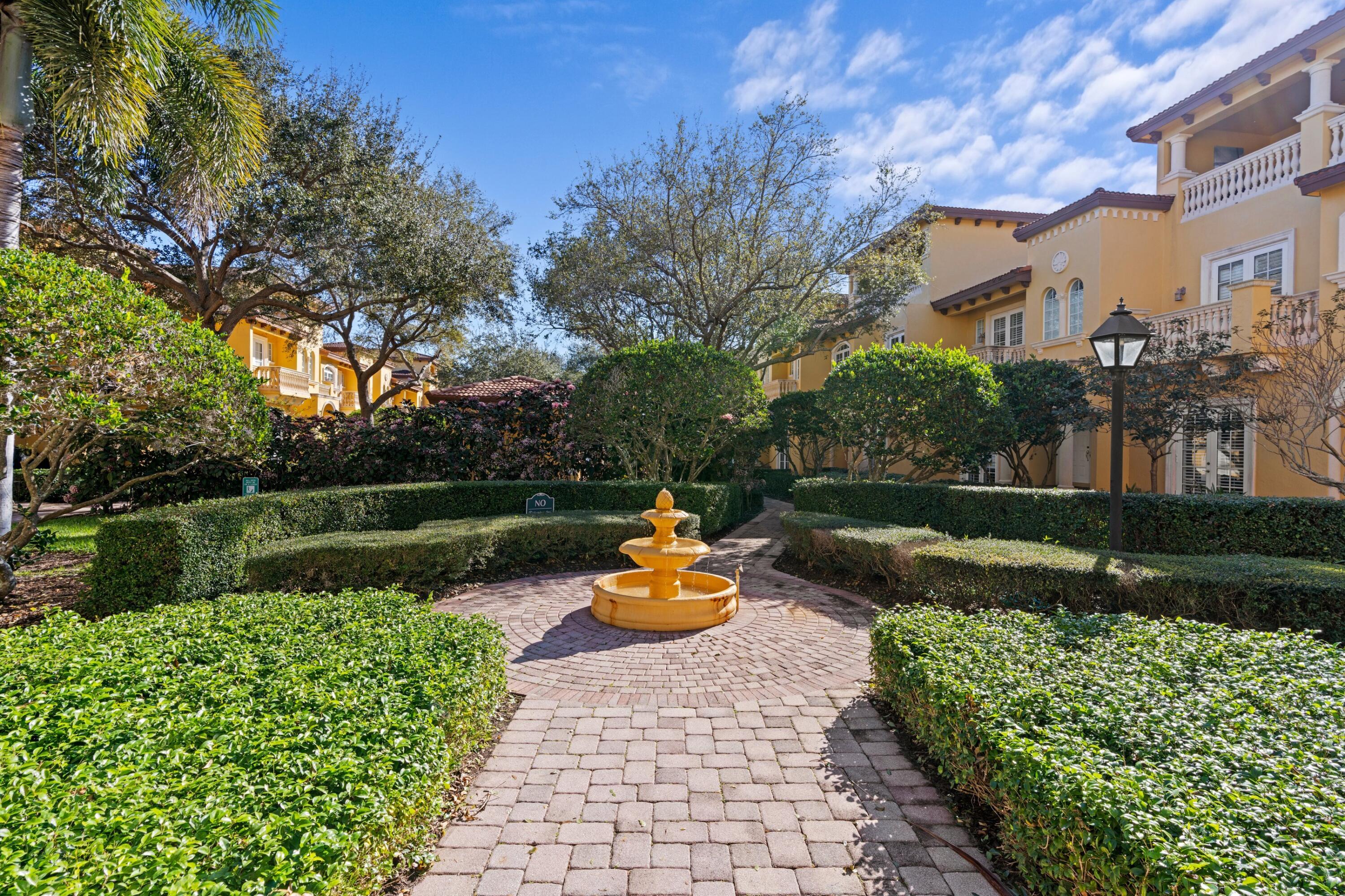 230 Northeast 69th Circle Boca Raton, FL 33487 - Photo 30 of 49 a park view with a bench in garden