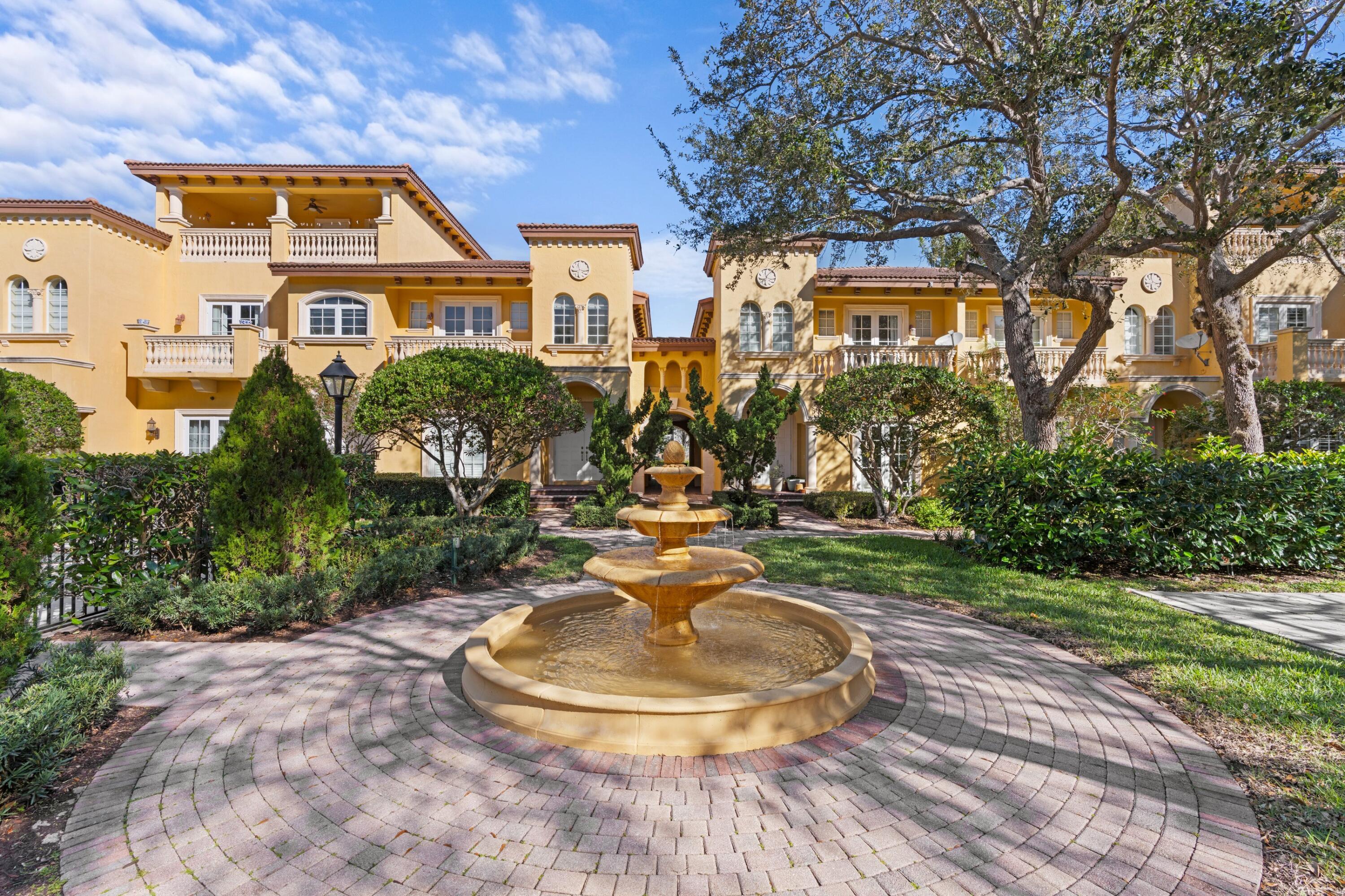 230 Northeast 69th Circle Boca Raton, FL 33487 - Photo 31 of 49 a view of a big yard with plants and a fountain