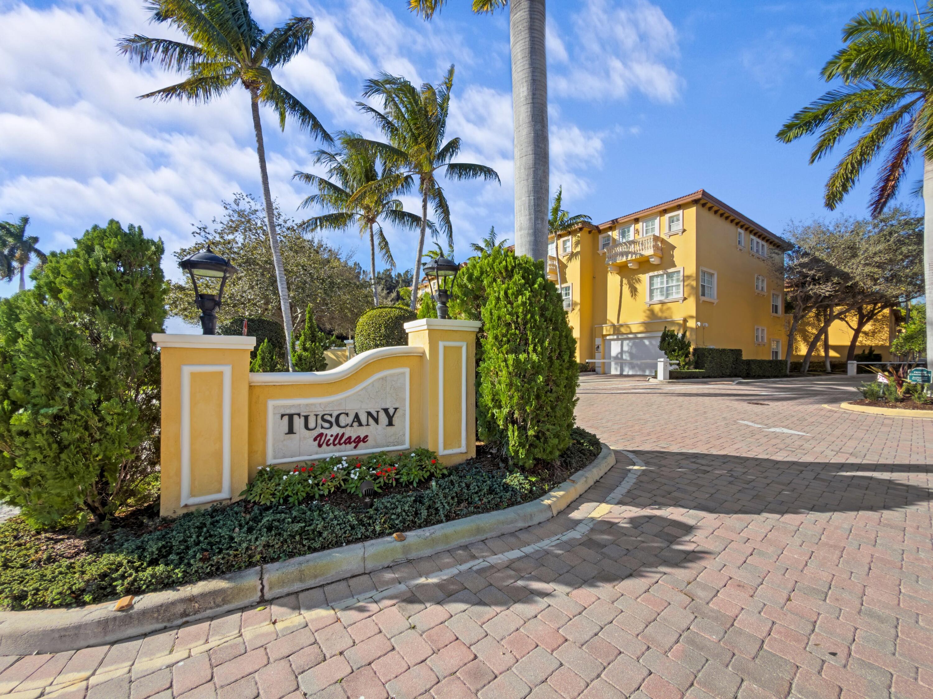 230 Northeast 69th Circle Boca Raton, FL 33487 - Photo 33 of 49 a front view of a house with a garden and a tree