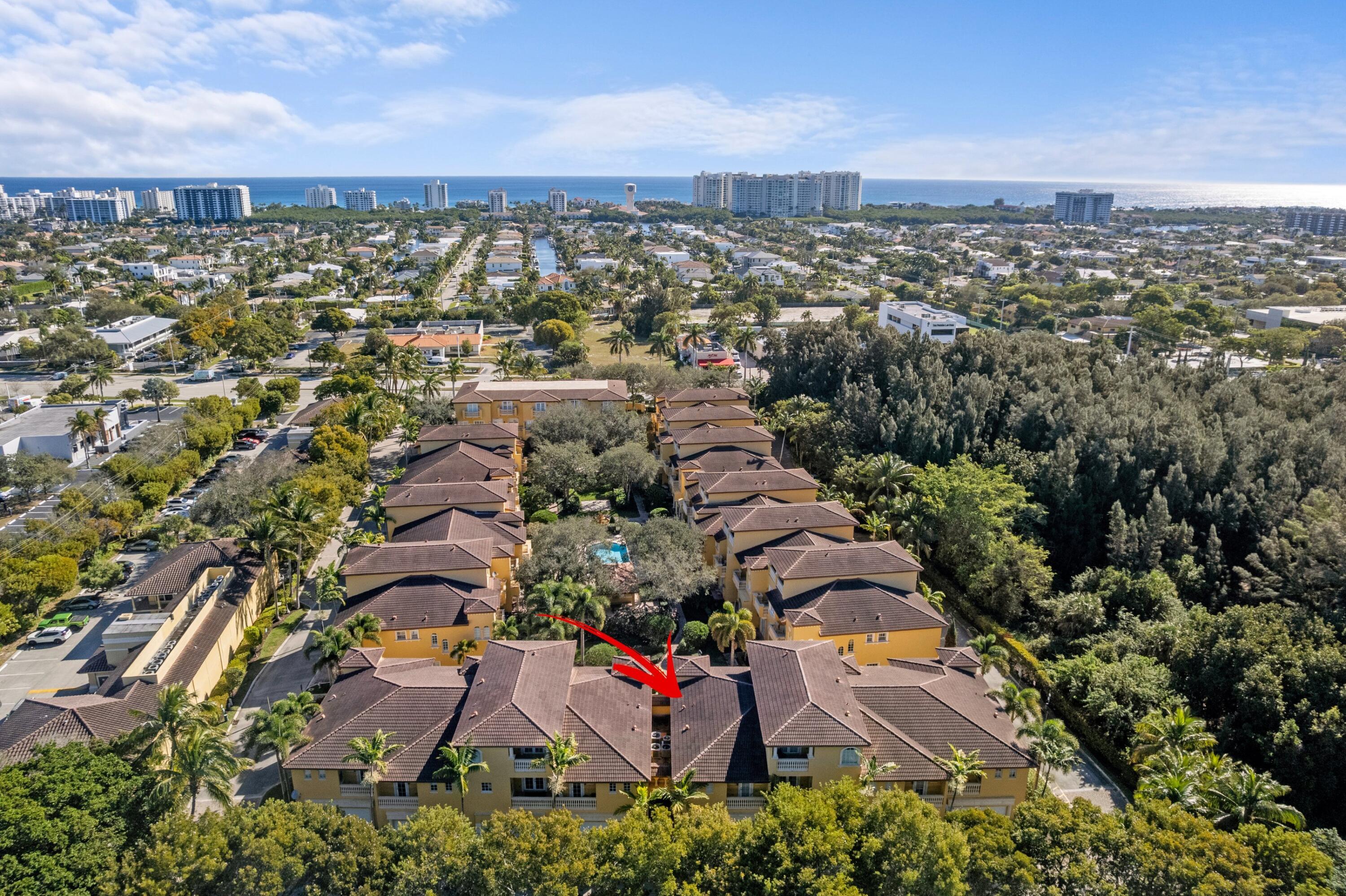 230 Northeast 69th Circle Boca Raton, FL 33487 - Photo 35 of 49 an aerial view of residential building with green space
