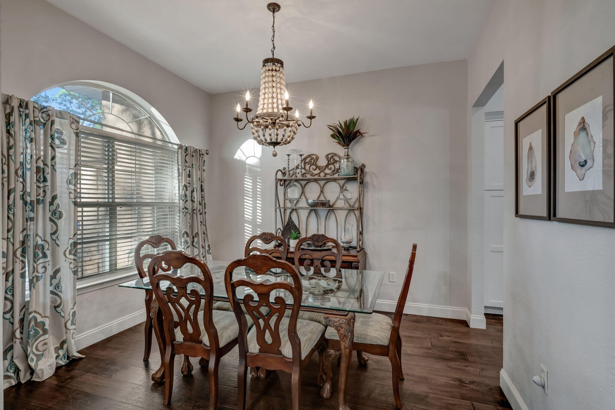 66 Driftwood Point Road Santa Rosa Beach, FL 32459 - Photo 11 of 72 a view of a dining room with furniture window and wooden floor