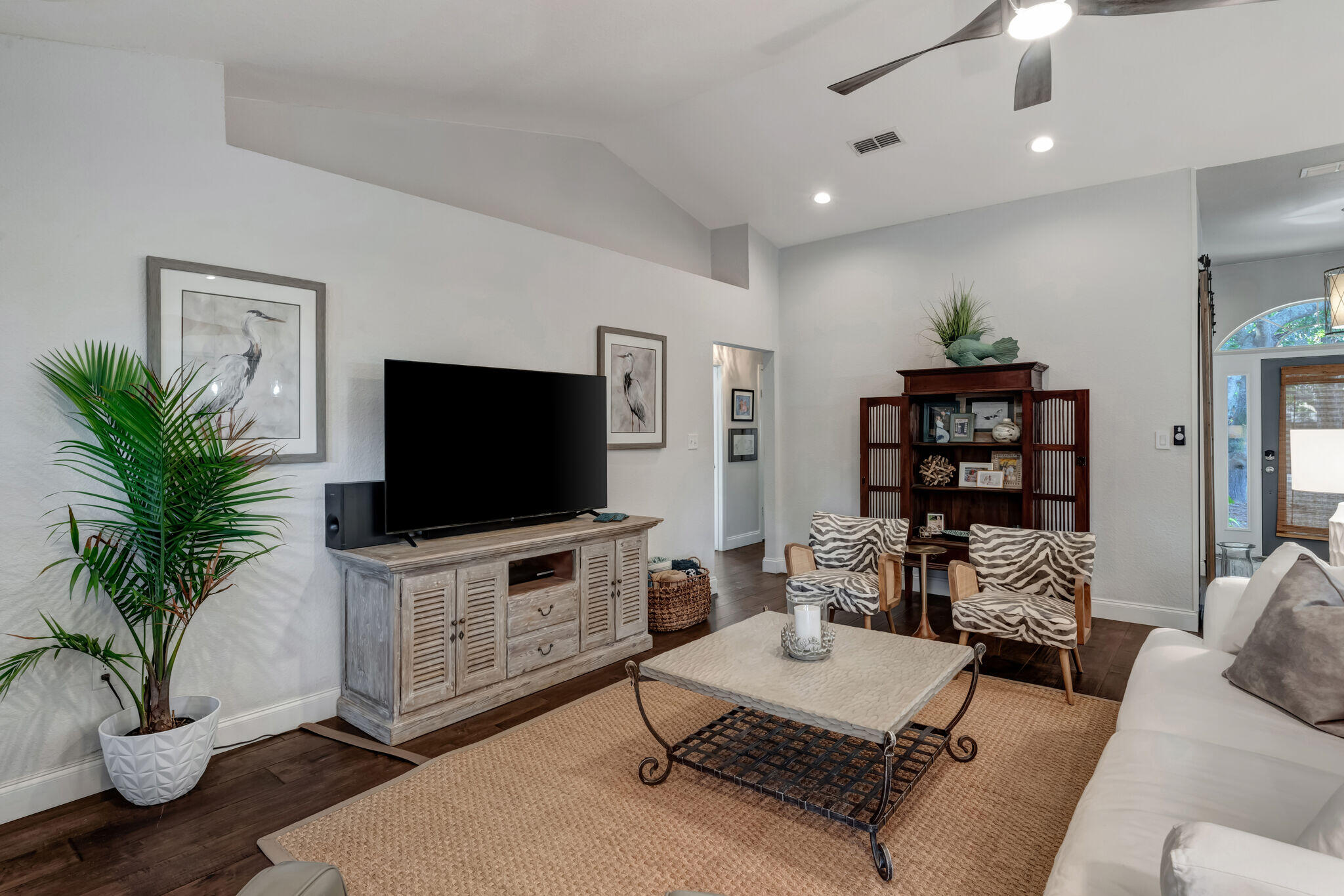 66 Driftwood Point Road Santa Rosa Beach, FL 32459 - Photo 14 of 72 a living room with furniture and a flat screen tv