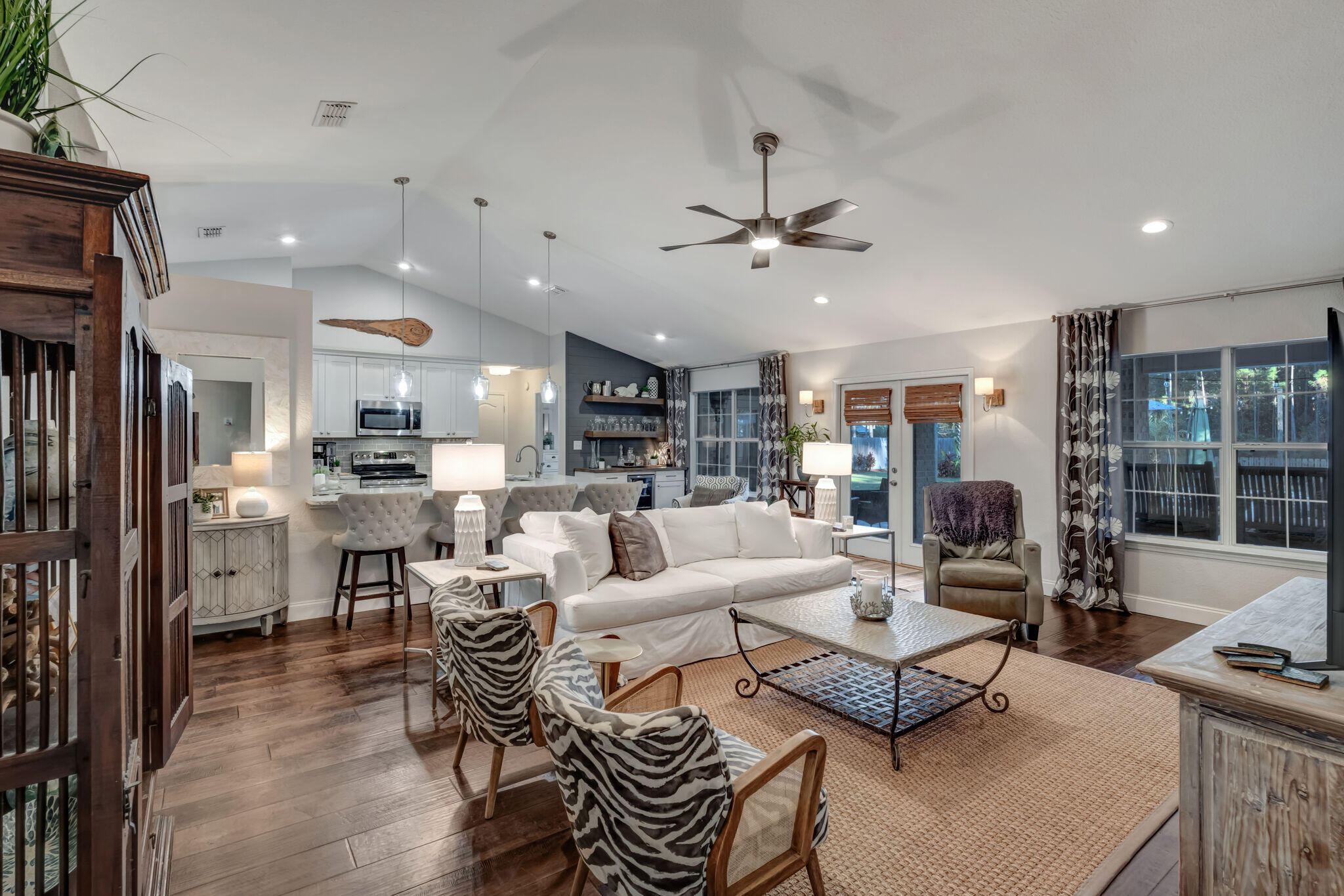 66 Driftwood Point Road Santa Rosa Beach, FL 32459 - Photo 15 of 72 a living room with lots of furniture kitchen view and a chandelier