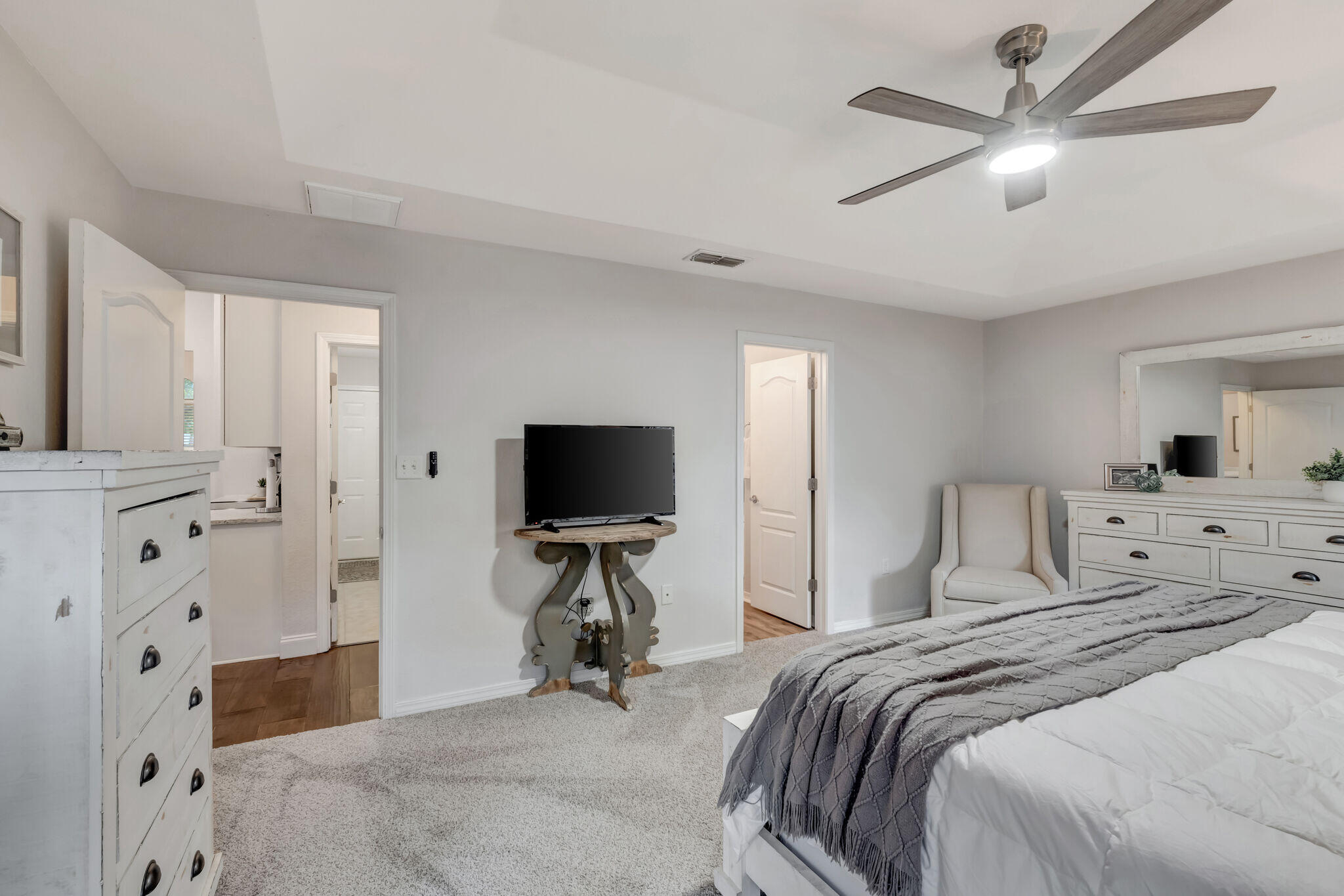 66 Driftwood Point Road Santa Rosa Beach, FL 32459 - Photo 24 of 72 a bedroom with a bed and a flat screen tv
