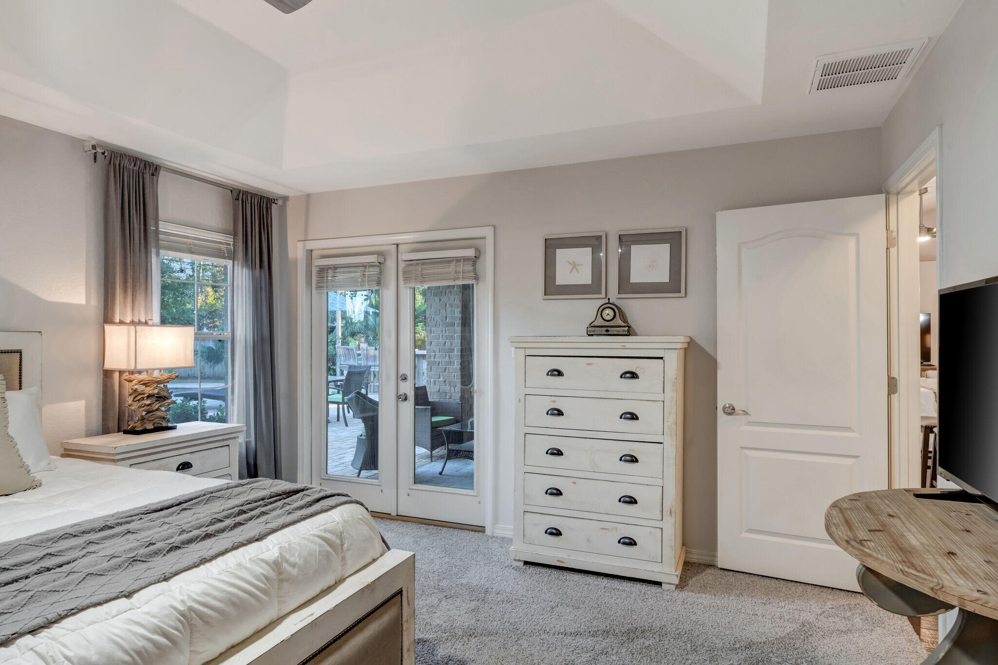 66 Driftwood Point Road Santa Rosa Beach, FL 32459 - Photo 26 of 72 a bedroom with a bed and a television
