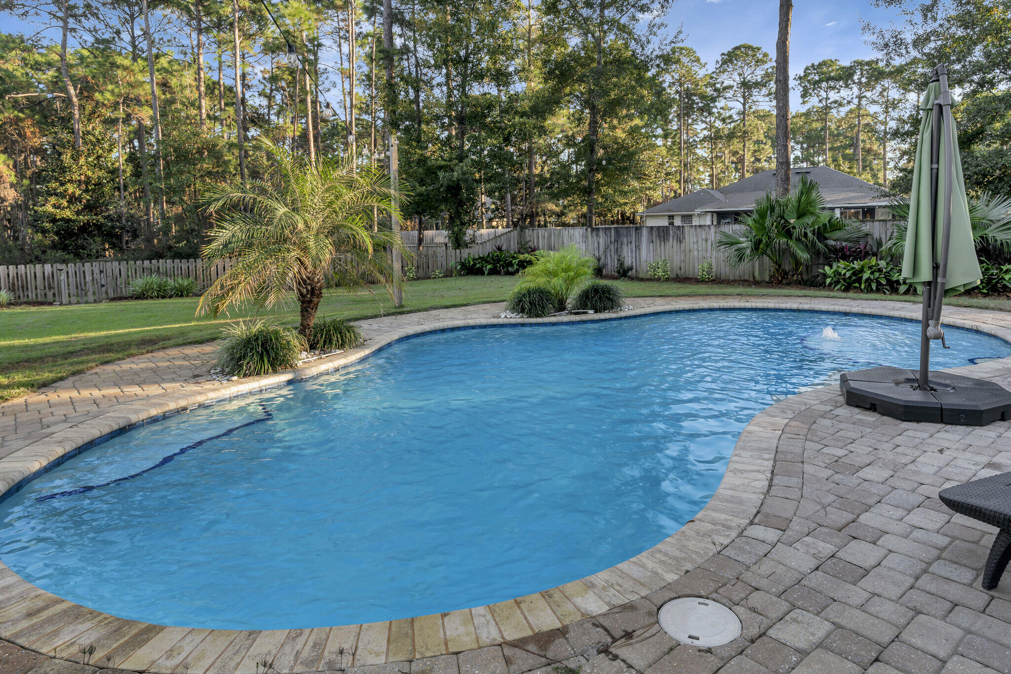 66 Driftwood Point Road Santa Rosa Beach, FL 32459 - Photo 44 of 72 a view of a swimming pool with a patio