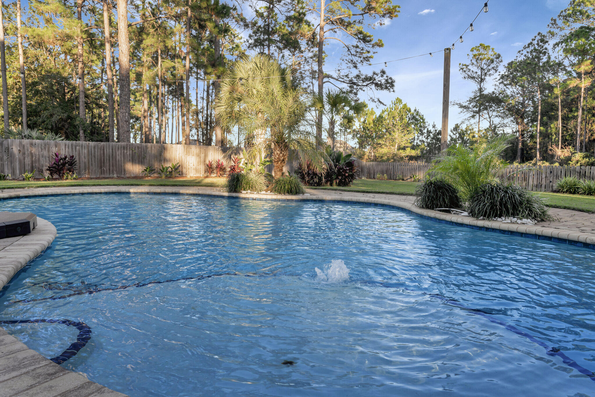 66 Driftwood Point Road Santa Rosa Beach, FL 32459 - Photo 47 of 72 a view of a swimming pool with an outdoor space and seating area