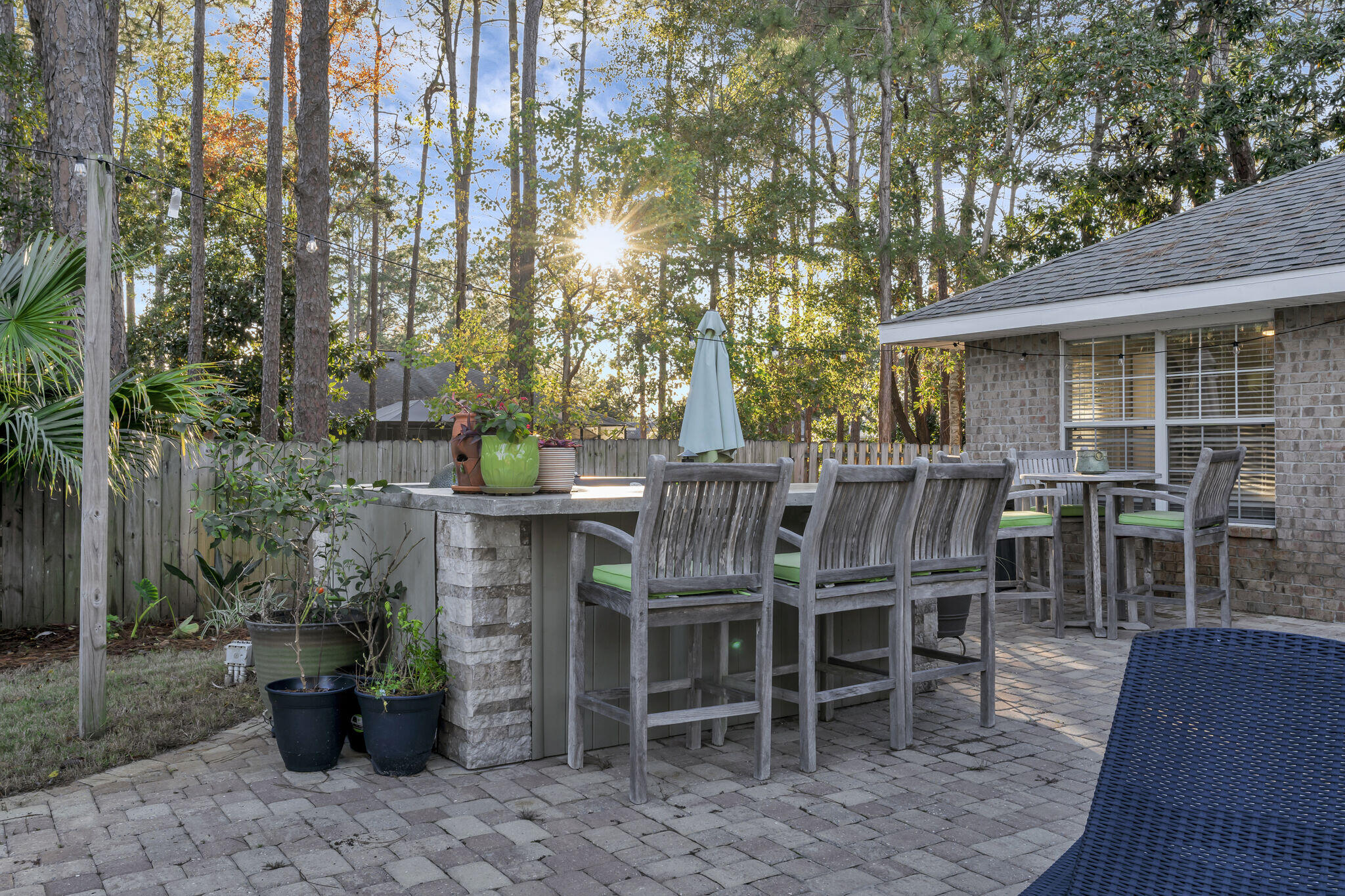 66 Driftwood Point Road Santa Rosa Beach, FL 32459 - Photo 49 of 72 a view of a chairs and table in the patio