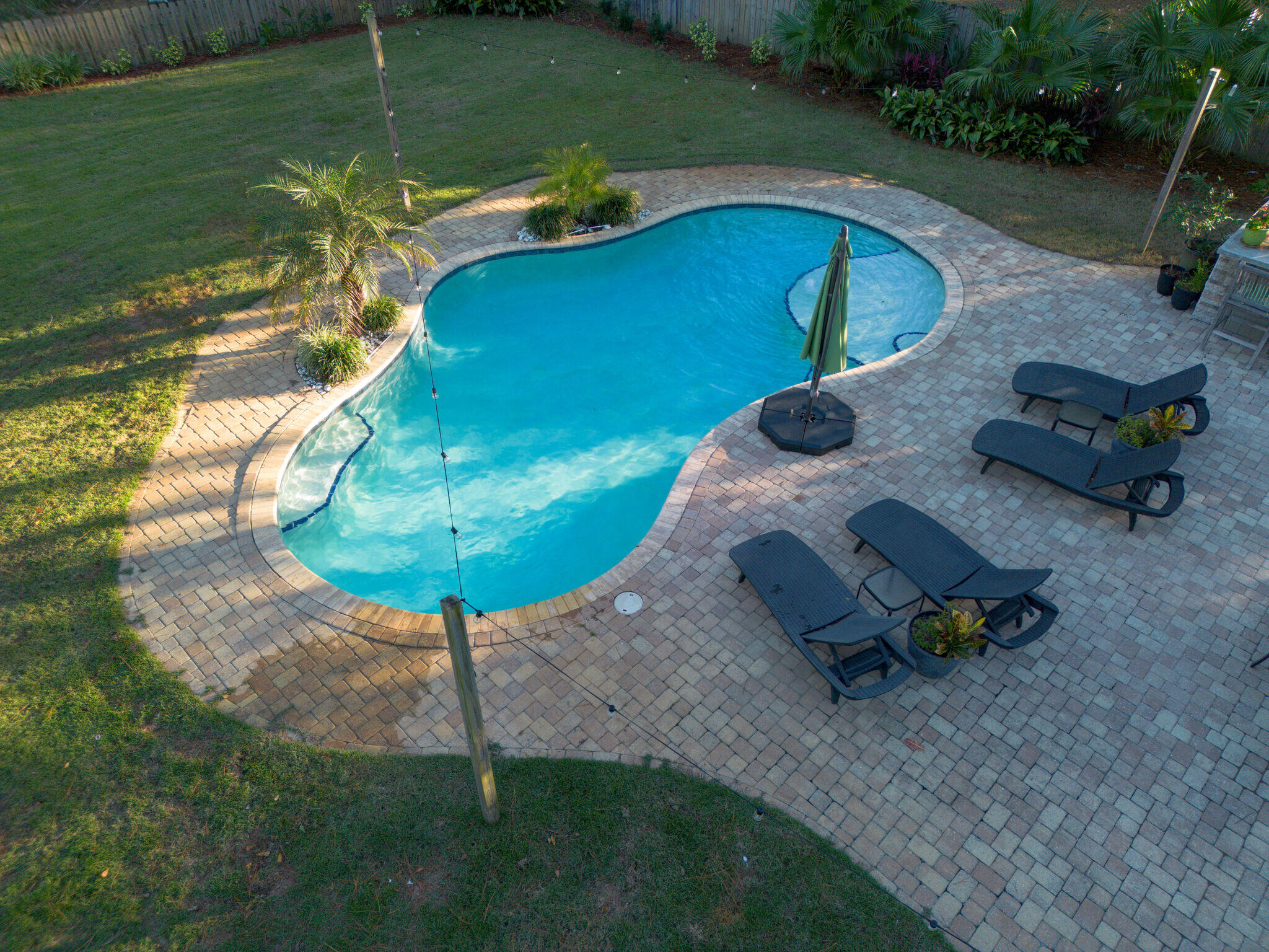 66 Driftwood Point Road Santa Rosa Beach, FL 32459 - Photo 64 of 72 a view of a swimming pool with a yard and sitting area